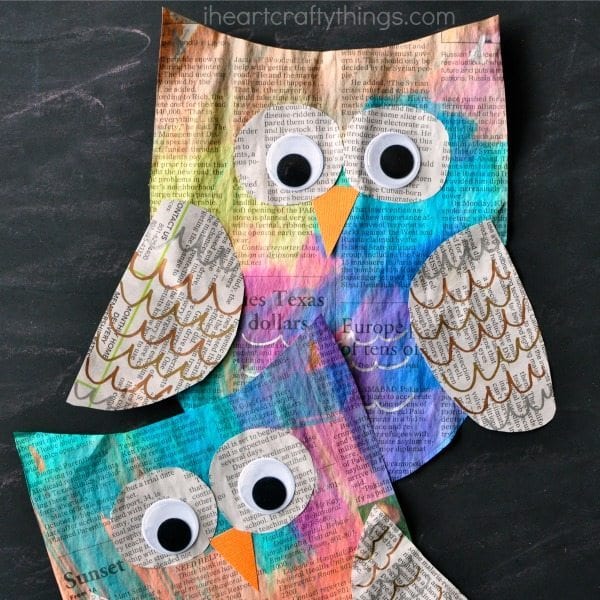Owls are made from newspaper pieces that have been painted.