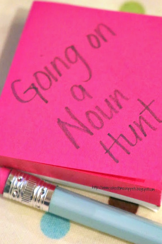 Pink post-it on desk that says Going on a Noun Hunt