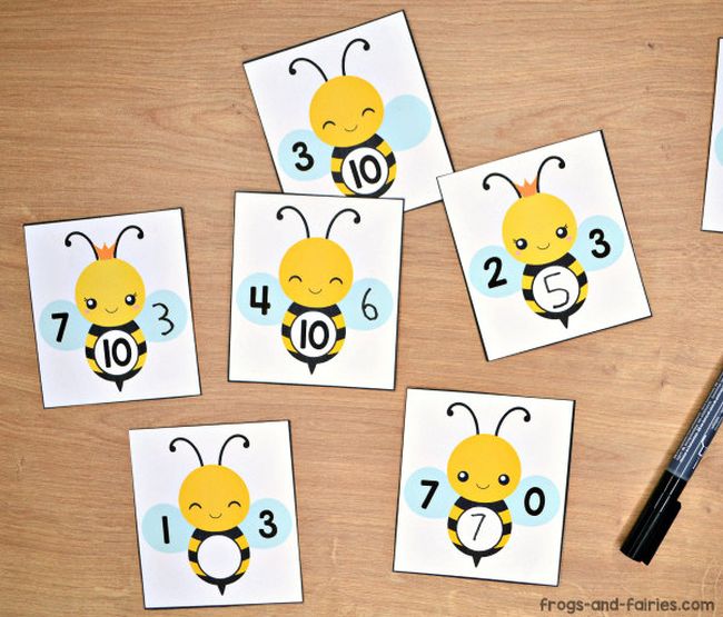 Printable cards of cartoon bees, with numbers written on the wings and bodies