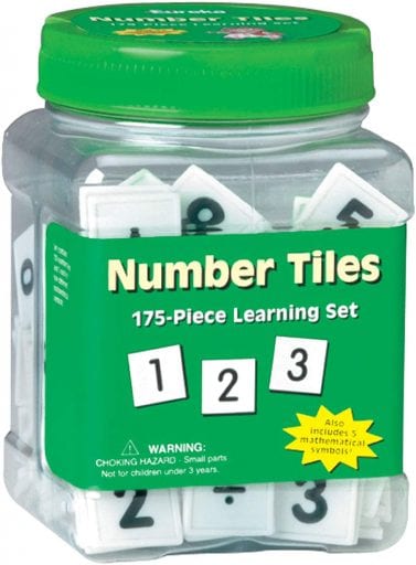 Tub of squares with numbers written on them.