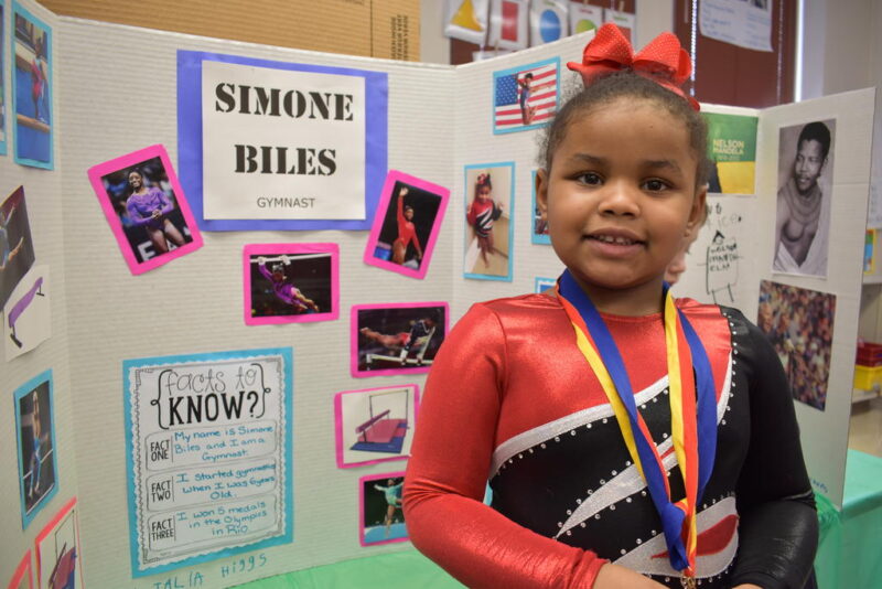 student being simone biles for a school project for black history month