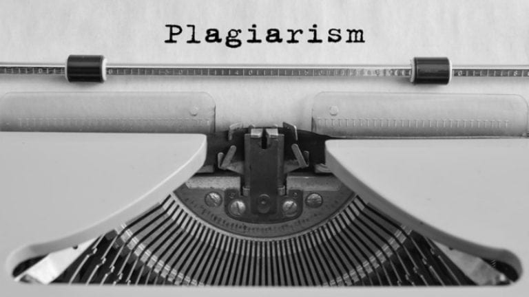 Plagiarism typed on an old typewriter (Online Plagiarism Checkers)
