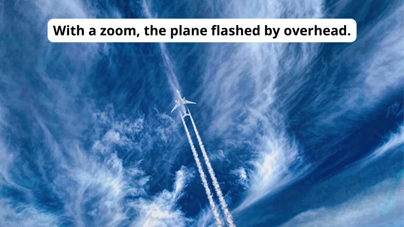A jet flying through cirrus clouds. Text reads With a zoom, the plane flashed by overhead.