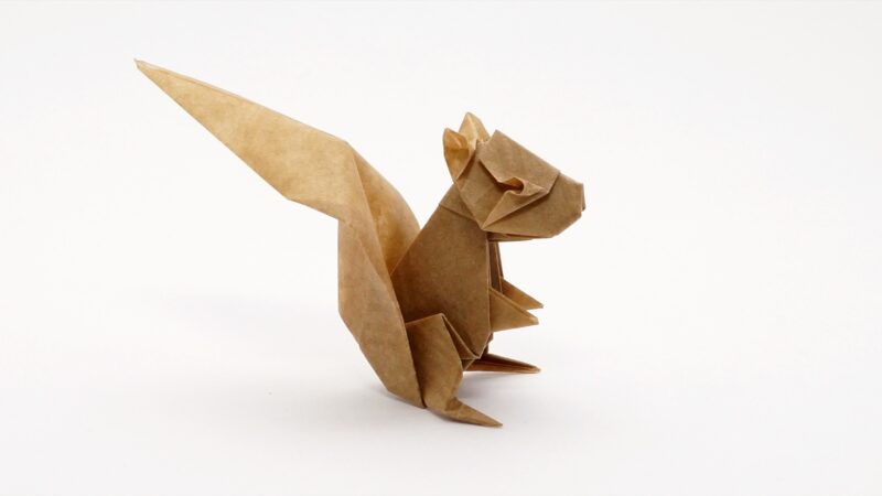 A squirrel sculpture made from folded paper