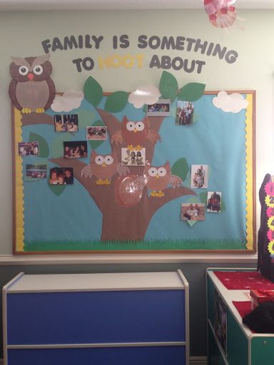 Bulletin board with "family is something to hoot about" written on it