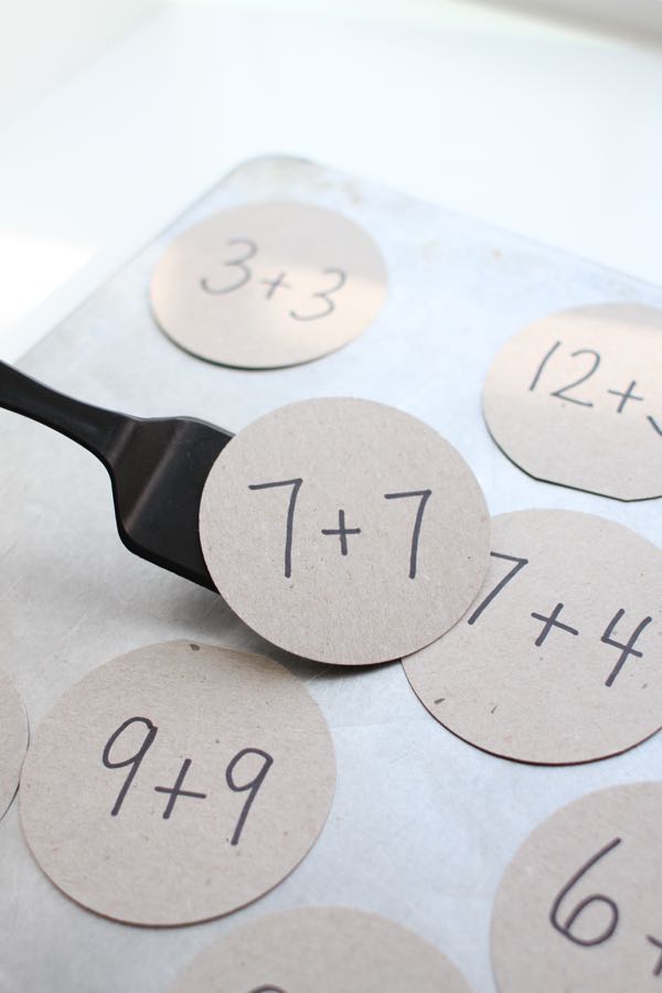 brown paper circles with math facts on them 