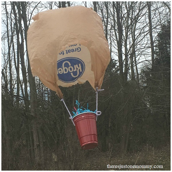 egg in a cup with a plastic bag parachute for an egg drop challenge