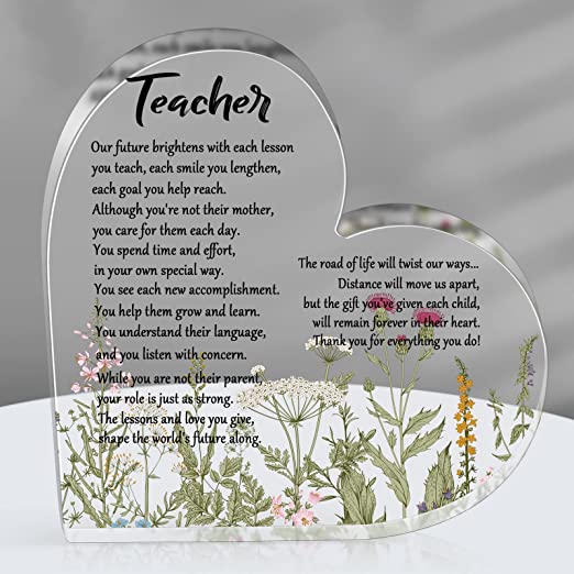 A heart paperweight is clear with a poem inscribed on it (best gifts for teachers)