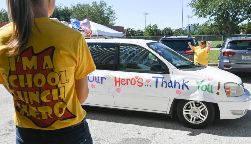 decorated car in a parade for national school lunch hero day
