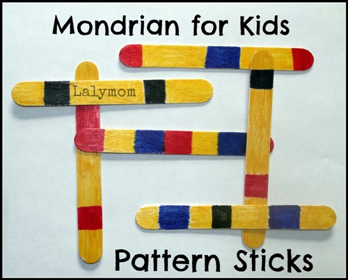 Popsicle sticks are shown decorated and arranged in a pattern.