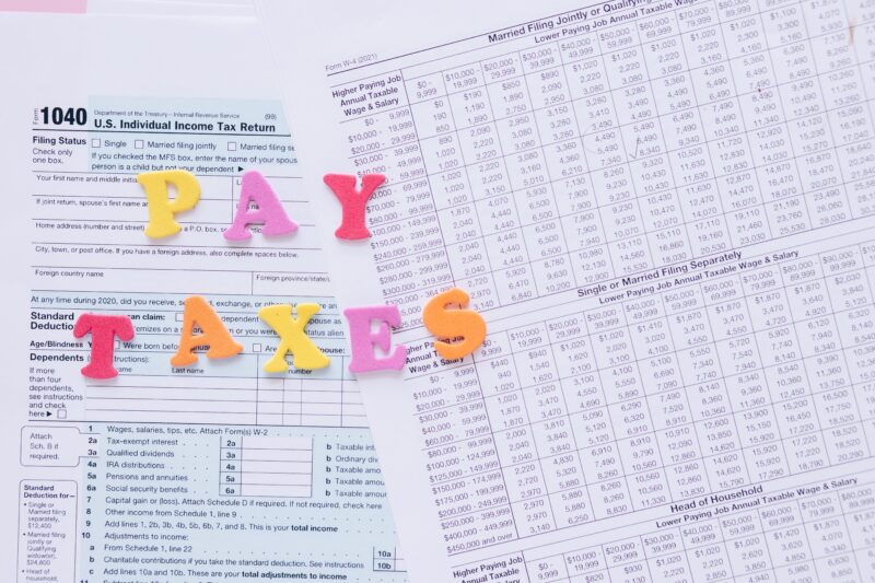 pay taxes written across tax forms 