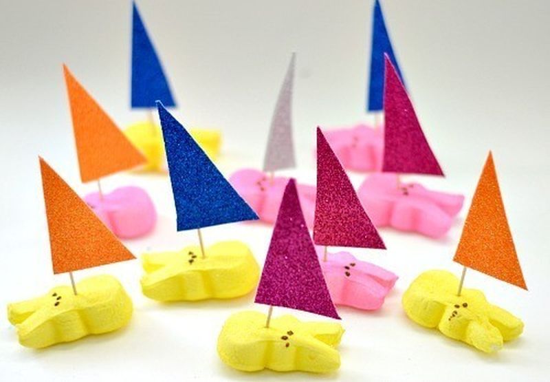 Bunny-shaped marshmallow candy Peeps with sails made from toothpicks and construction paper