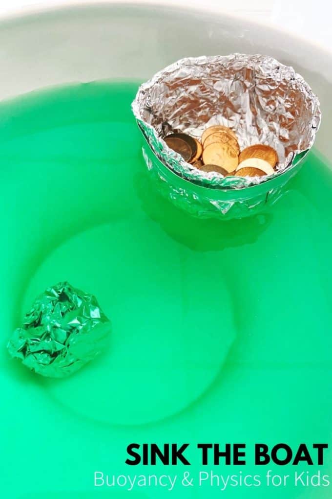 A tin foil boat holds a bunch of pennies and is seen floating in green water.