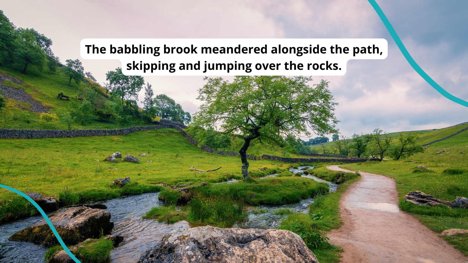 A brook running over rocks next to a rural path. Text reads: The babbling brook flowed alongside the path, skipping and jumping over the rocks.