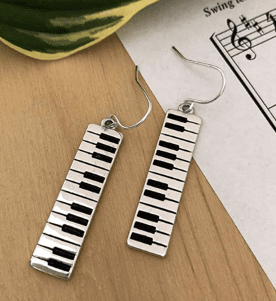 Silver and black piano dangle earrings
