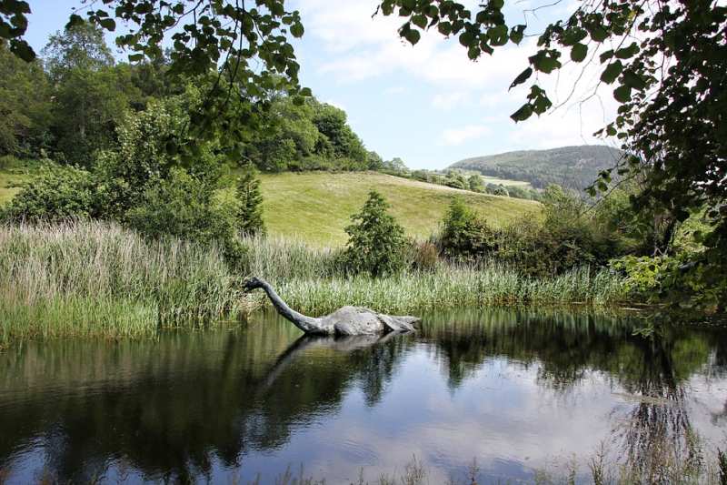 Model of the Loch Ness Monster rising from a lake