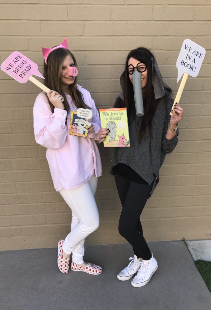 A woman dressed up as a pig and another woman dressed up as an elephant are shown.- book character costume