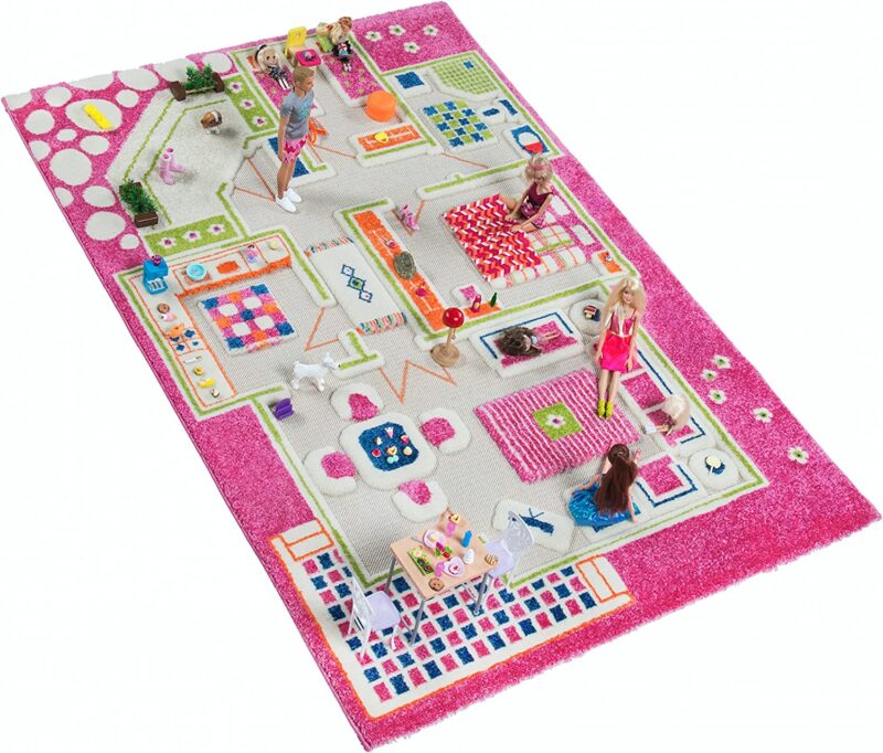 A pink rug is divided into rooms of a house with furniture printed on it.