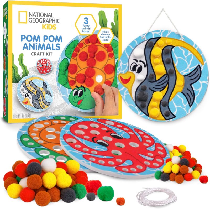 Circles with different sea life on them have holes cut in them for pom poms to be inserted to decorate them.