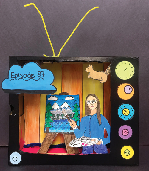 A television has been constructed from a box and features a 3D drawing of a girl painting in this example of art projects for middle schoolers.
