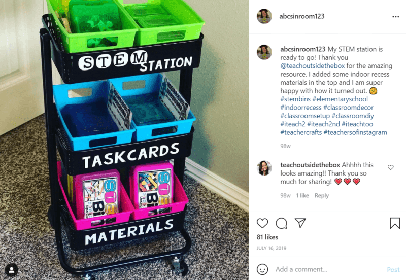 Black teacher cart labeled stem station features experiment cards and materials