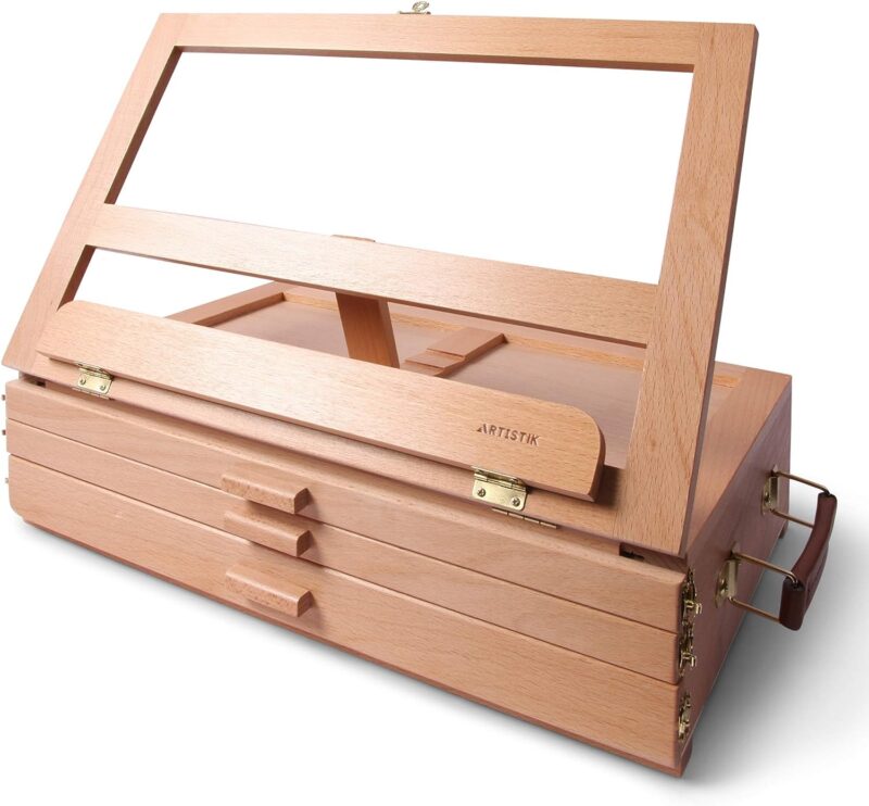A wooden easel has three drawers built into the bottom in this example of an art easel for kids.