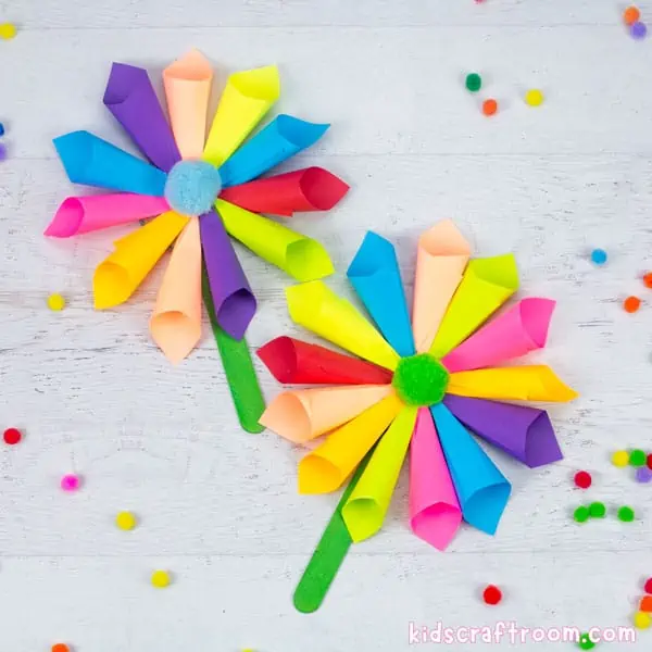 Flowers are made from rolled up different colored sticky notes (spring crafts for kids)