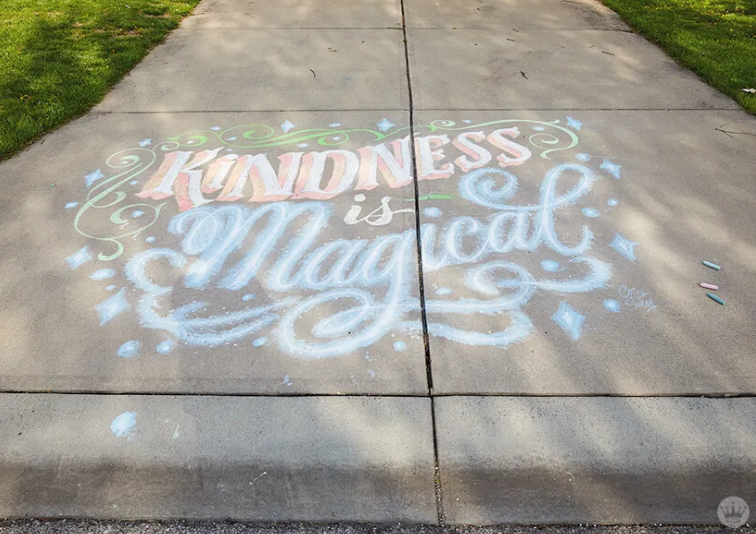 Chalk drawing with words Kindness is Magical