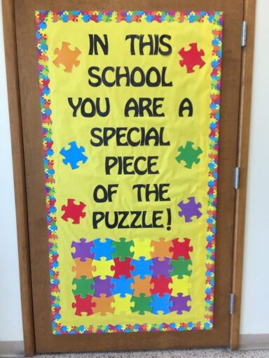 in this school you are a special piece of the puzzle! Classroom door decoration with puzzle border and puzzle pieces