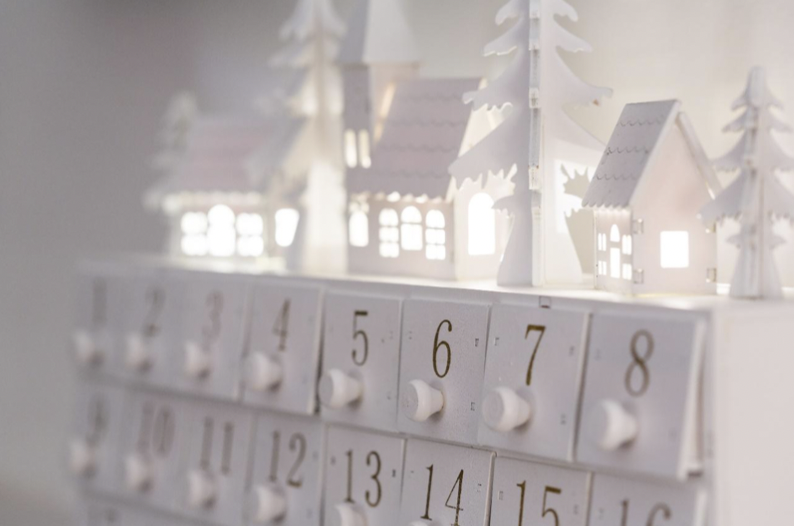 White advent calendar with pixie lights