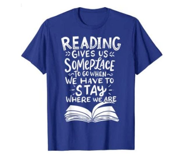 Blue t-shirt reading Reading Gives Us Someplace To To When We Have To Stay Where We Are (Reading Shirts)