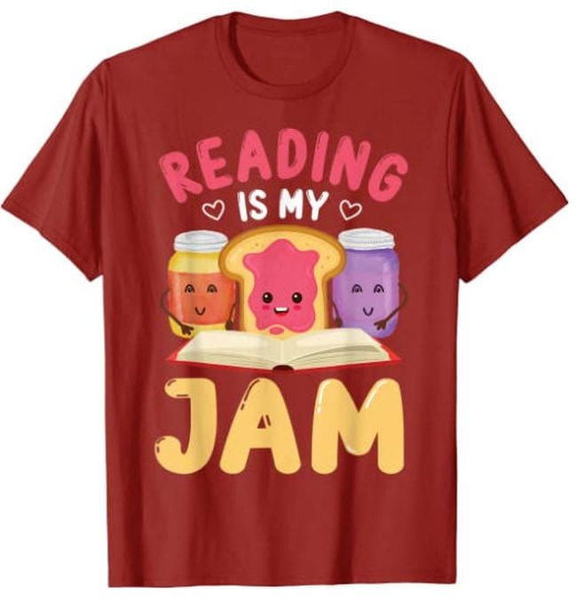 Red t-shirt with pictures of peanut butter and jelly saying Reading Is My Jam