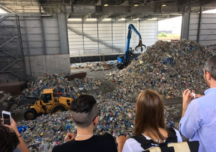 teens visiting a recycling center-recycling activities