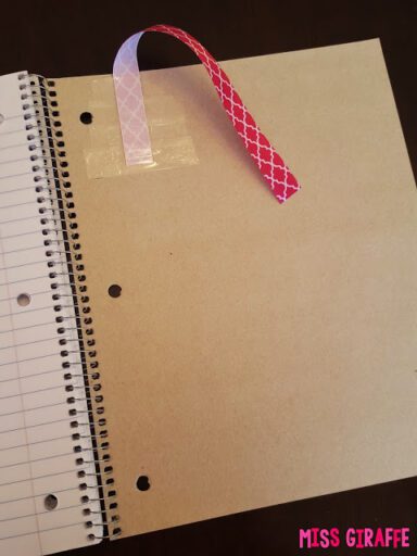 Attach ribbon to the back of a notebook for students to remember where they left off