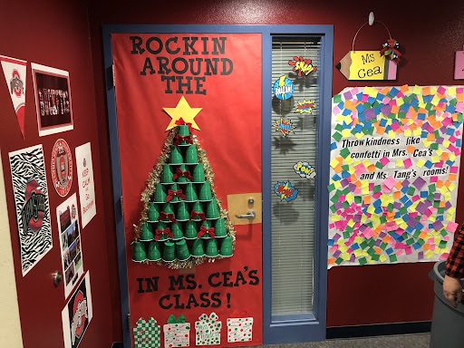 Door with words "Rockin around the... In Ms. Cea's class!" 