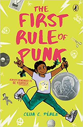 Book cover of The First Rule of Punk by Celia C. Perez with illustration of girl singing into a microphone.