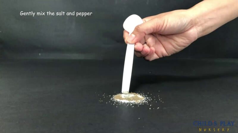 spoon by salt and pepper for an electricity experiment 