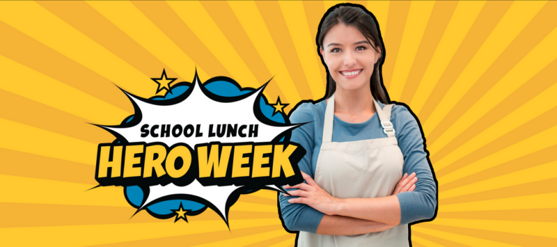 woman in apron standing with arms crossed. national school lunch hero week 
