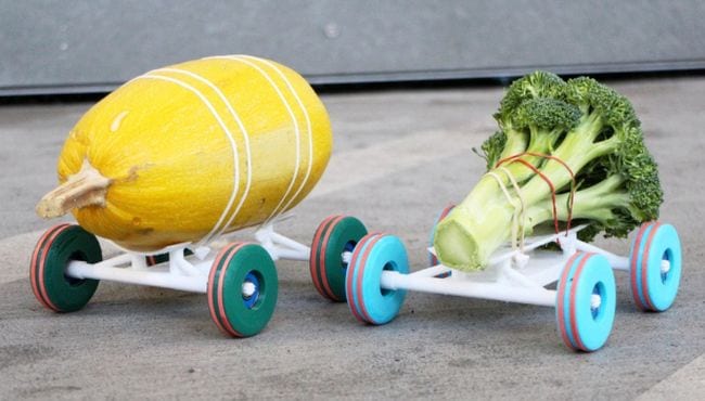 Simple 3-D printed race cars with vegetables strapped to them (Science Experiments for High School)