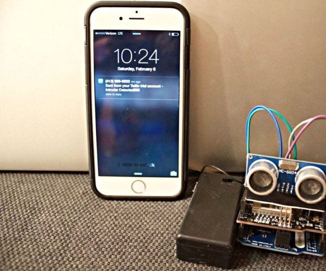 Simple electronic burglar alarm with a cell phone