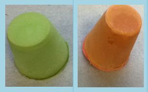 Lime green and orange homemade soap as part of a science experiment
