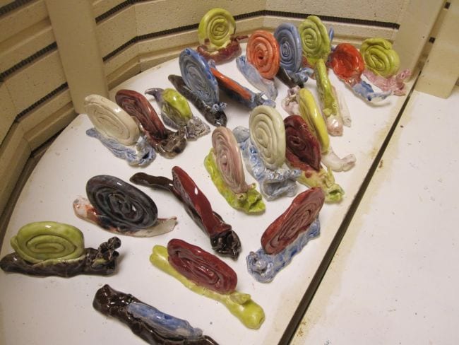 Snails made by coiling clay for the shells (Second Grade Art)