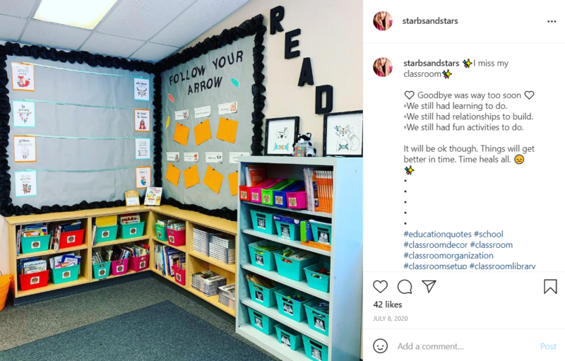 Reading nook in a second grade classroom with shelves and motivation signage