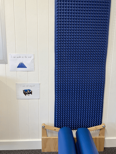 Sensory mat hung up in a classroom, , as an example of sensory room ideas