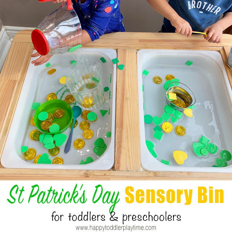 two small children are shown in front of two tubs of water with St. Patrick's Day items floating int it (St. Patrick's Day crafts for kids)