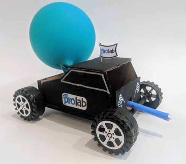 Balloon-powered car made from cardboard (Seventh Grade Science)