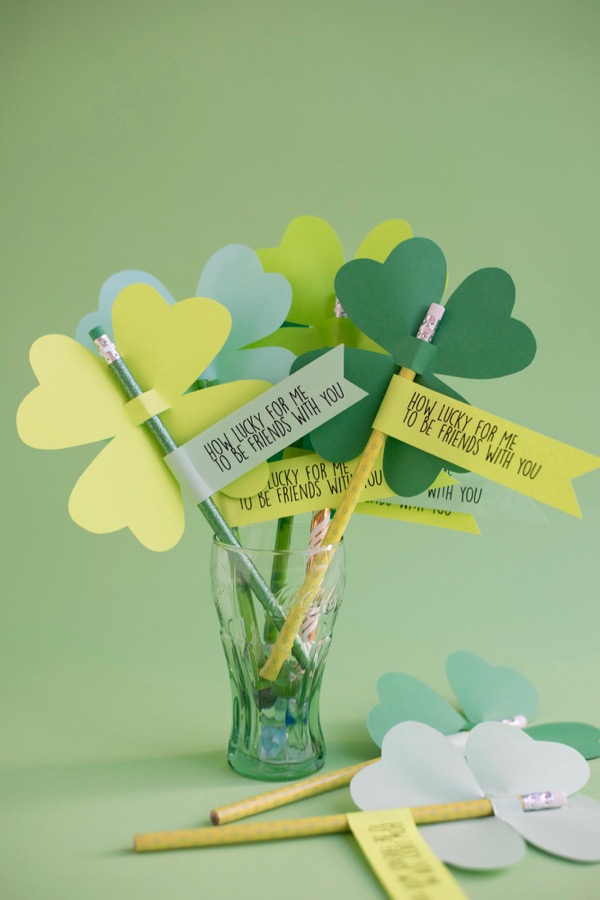 shamrock pencil toppers made from construction paper, as an example of St. Patrick's Day activities 