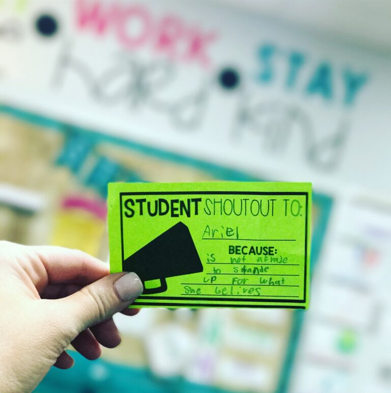 A bright green card with a student "shout out" written on it
