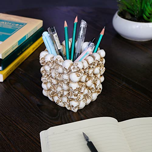 pen holder covered in mini skulls for a halloween teacher's gift 