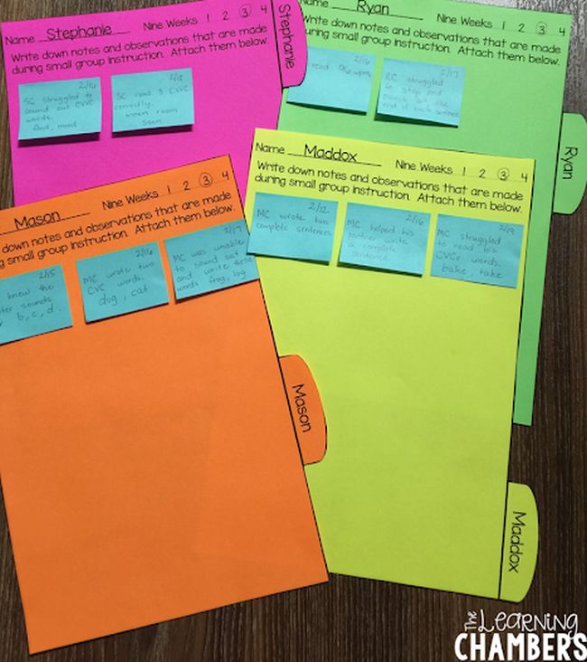 Comments written on sticky notes and attached to colorful pages for individual children during group instruction